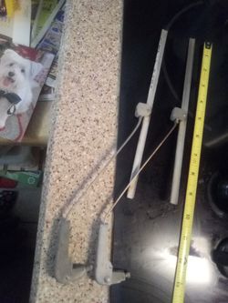 2 very old windshield wipers not sure what kind of car it came off from
