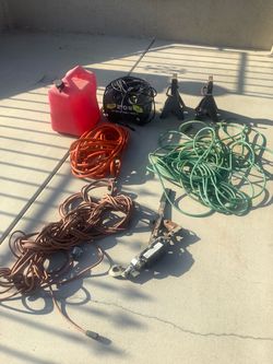 2 Air hoses ** jack stands ** extension cord ** gas can ** wench** ryobi pressure washer