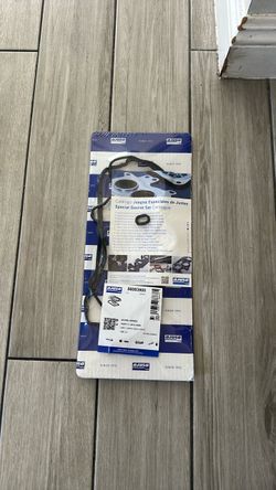 Brand new AJUSA Valve Cover Gasket, still in original packaging.