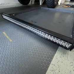 Jeep custom roof rack & 40” Rigid light bar
