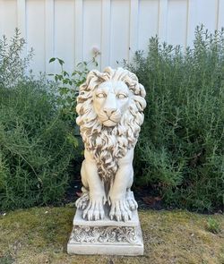 Two Outdoor Lion Garden Statues