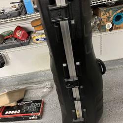 Travel golf bag carrier