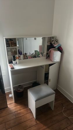 White vanity with stool