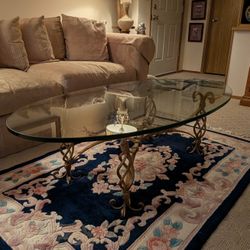 60" Oval Glass Coffee Table With Bronze  Gilded Legs 