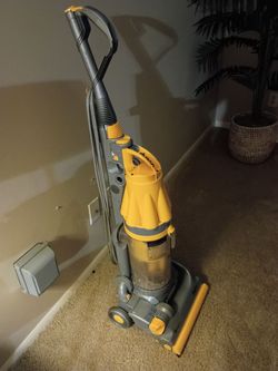 Dyson all floors root cyclone upright vacuum.