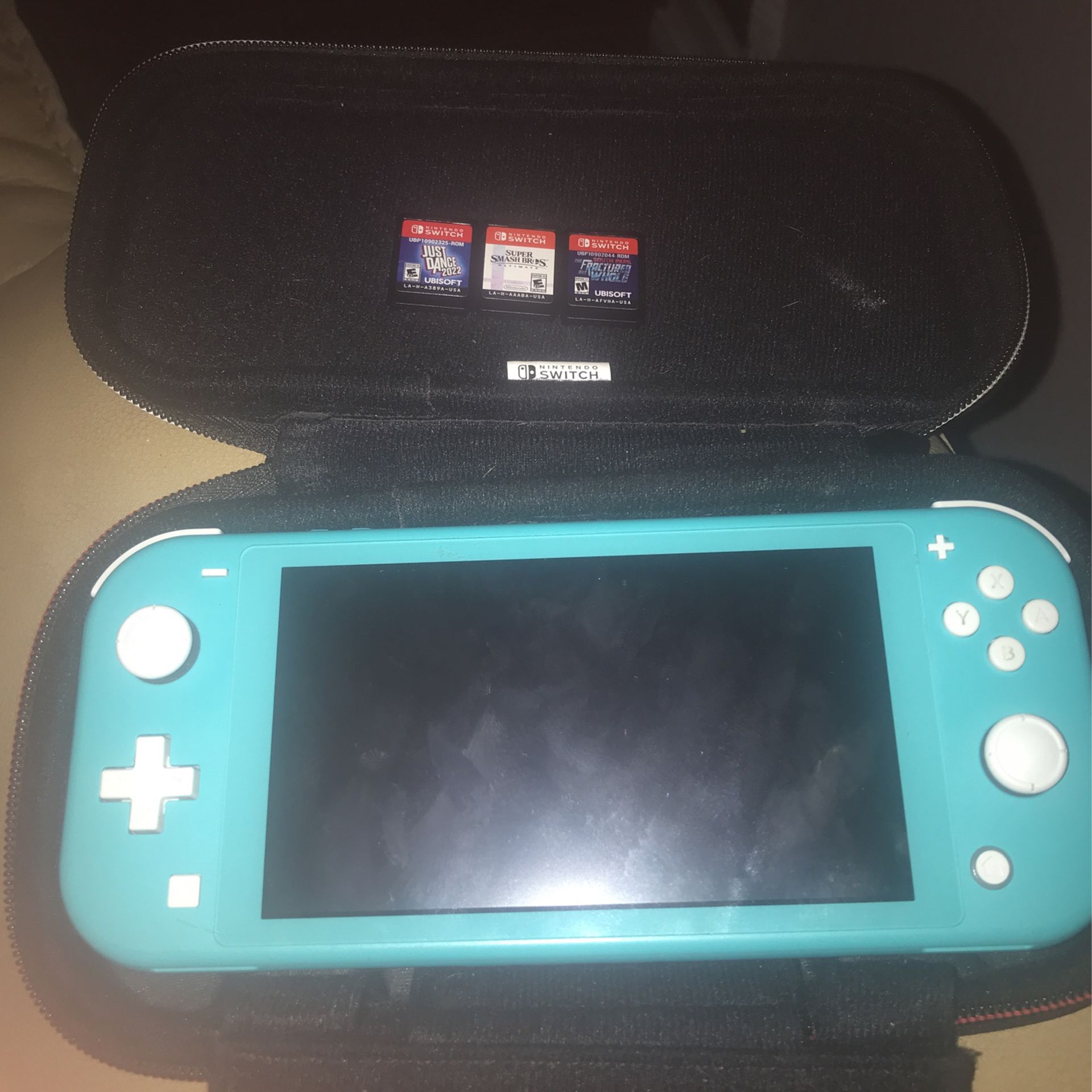 Blue Nintendo Switch Light Comes Wit A Case