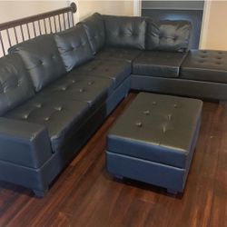 [HOT DEAL] Heights Black Faux Leather Reversible Sectional with Storage Ottoman Happy Homes 