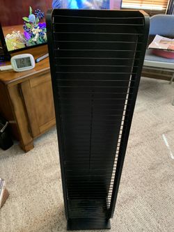 DVD Holder Stand and 53 DVDs all listed in pics
