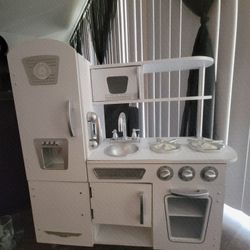 play kitchen with bag of play food