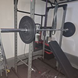 Squat rack, weight tree, and steel plates