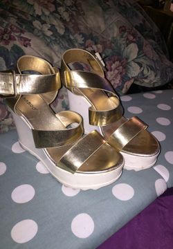 Gold and white heels