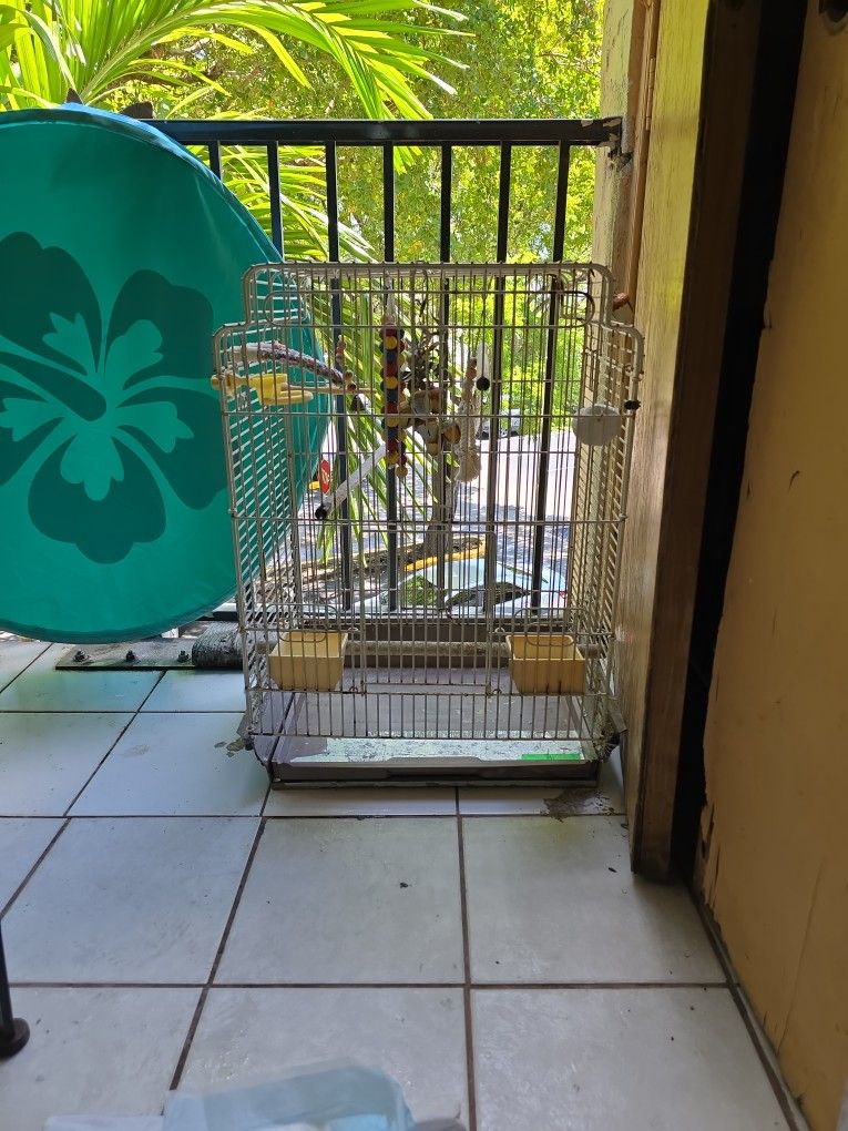 Medium Size Bird Cage. Needs TLC.