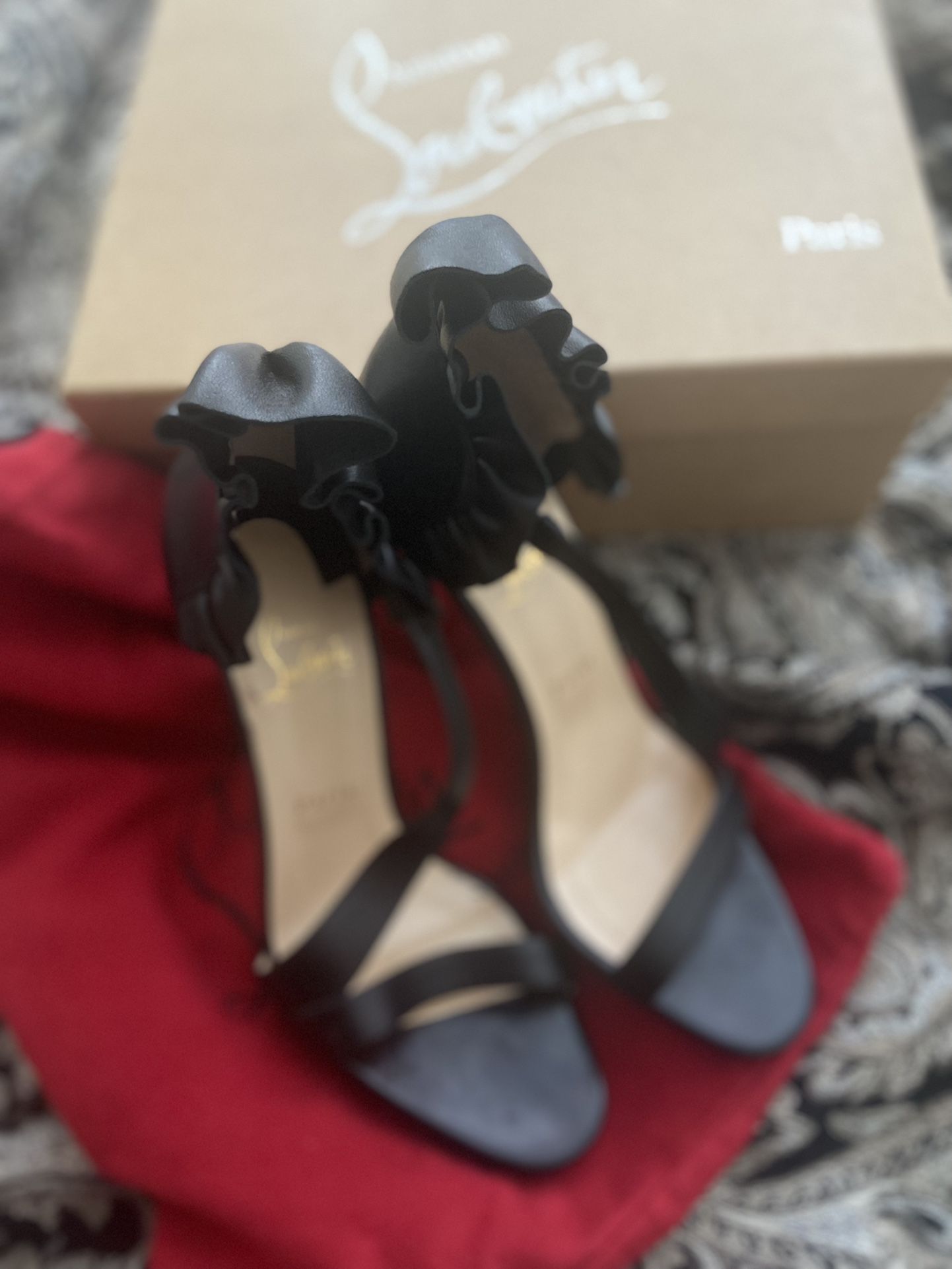 Gently worn Louboutin red bottom heels
