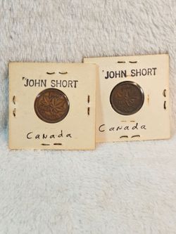 #652 Lot of 2 foreign coins