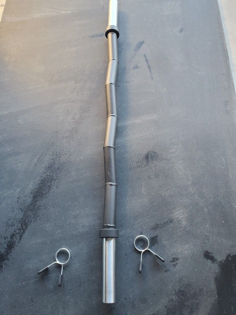 New Condition Olympic Curl Bar not the cheap kind below retail price.all info in last pictures..