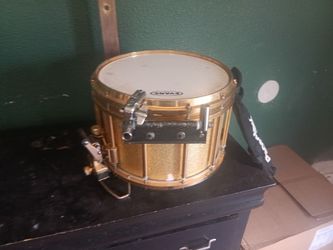 Pearl drum with stick holder