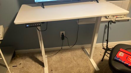 Desk that moves up and down tv not included