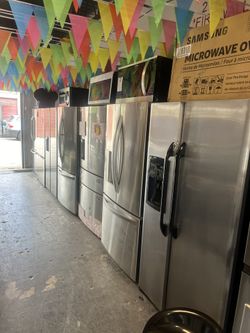 Kitchen package stainless steel refrigerator stove dishwasher and microwave great condition working perfect tasted With Warranty delivery and installa