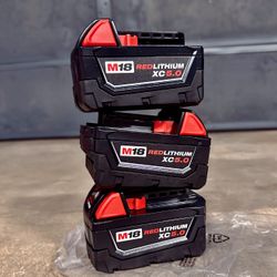 Three Milwaukee M18 5.0 Batteries