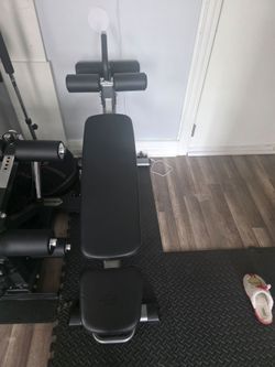 Work out bench and leg extension attachment (decline feature for situps)