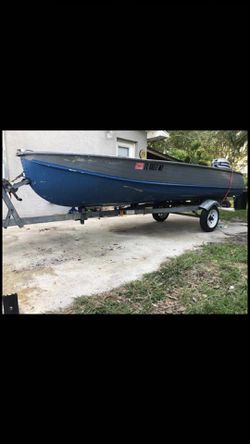 14ft boat ,35 hp motor and trailer