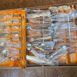 Antique Box Full Of Spoons, Forks And Knifes