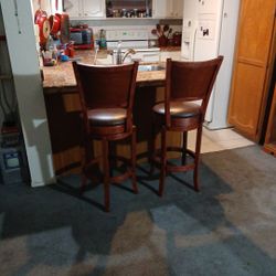 Mahogeny Swiveling Bar Stools