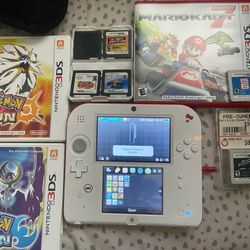 SuperMario 2ds with pencil and charger
