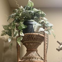 Wicker Stand With Fake Plants 