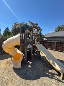 Old Wooden Backyard Playset with Slides