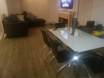 Couch and table with chairs