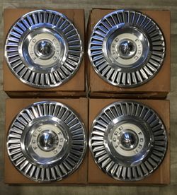 1957 NOS 14” HUB CAPS