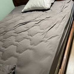 Queen bed with mattress and box spring
