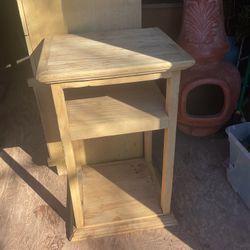 A wood cabinet it’s 28 inches tall and 16 by 17 inches across the top