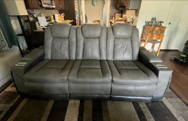 Dual power reclining sofa