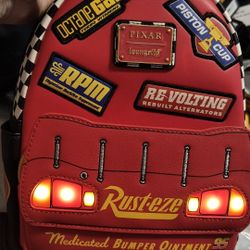 Loungefly Disney Pixar Cars Lightning McQueen Rust-eze Light-up Mini BackpackNWT