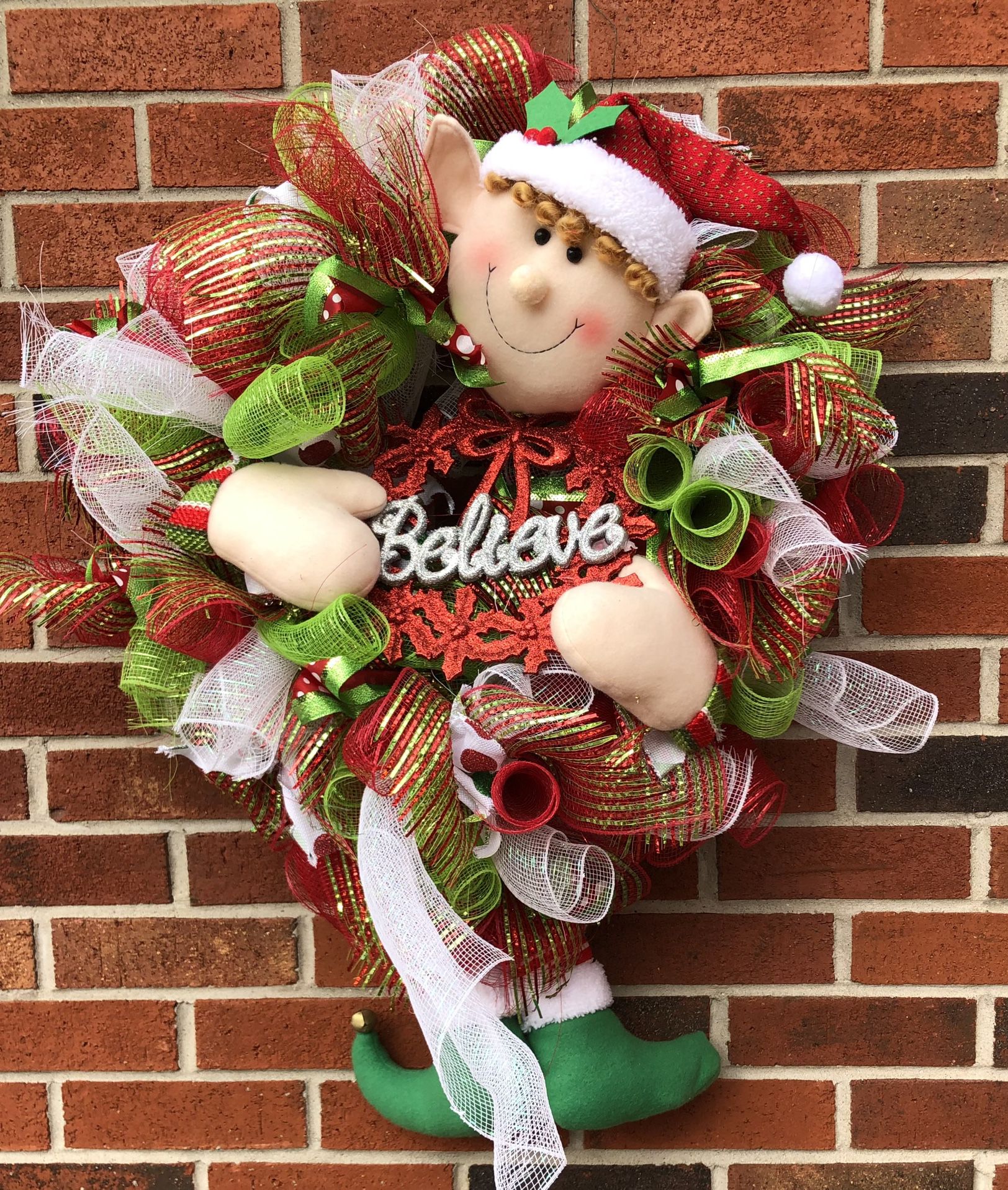 CHRISTMAS WREATH WITH HOLIDAY ELF IN CENTER