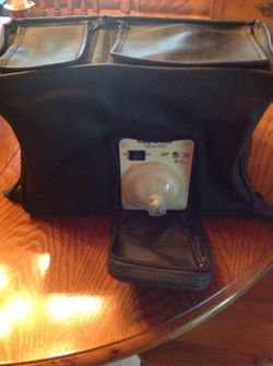 Pump in style breast pump