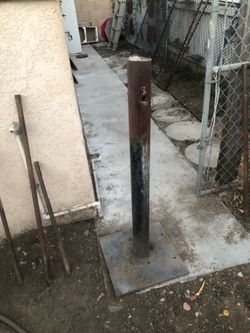Heavy duty post  Filled with cement with plate for grinder or vise