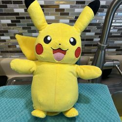 Pokémon Pikachu light up, talking  and moving plush. Tie to ear top is 13”.