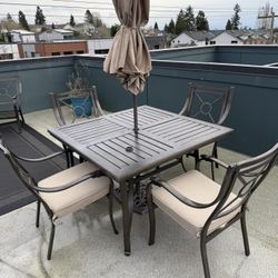 Outdoor Patio Table (4 Chairs + Umbrella)