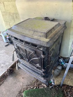 Whitfield Pellet Stove with attachments (exhaust)