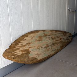 Old wooden surfboard! Very unique!