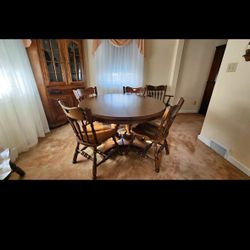 Kitchen/dining table and 6 chairs.