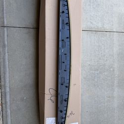 Rivian R1T tailgate top moulding