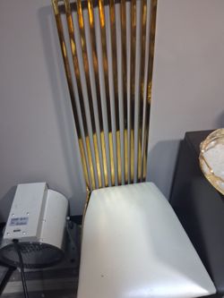 Gold and white chairs