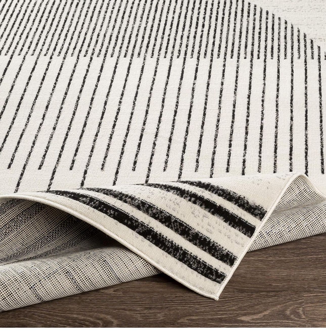 Modern Geometric Area Rug (7’10” x 10’) Ivory & Black