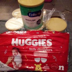 6 Cans Enfamil  Reguline / Bag Of Huggies  Newborn Diapers 