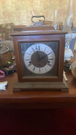 vintage German-made mantel clock, likely featuring Westminster chime