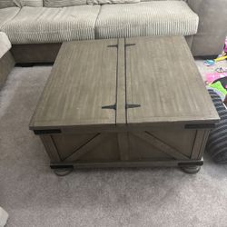 Coffee table with a huge storage inside